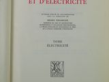 an open book with a picture of a cat on the cover