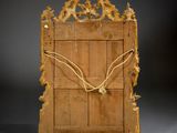 an image of a wooden frame with a clock on top of it