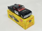 a toy police car sitting on top of a box