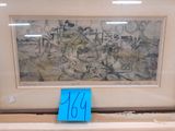 a picture of a painting on display in a glass case