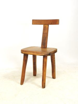 a wooden chair with a wooden seat on a white background