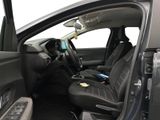 the interior of a car with the door open showing the driver ' s seat area