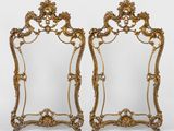 une paire de miroirs dorés à cadre doré