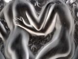 a picture of a glass sculpture of two women