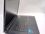 a laptop that is sitting on a white table