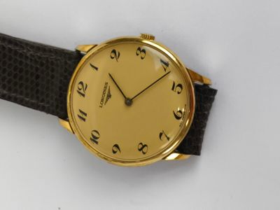 LONGINES MONTRE en plaqué-or, mouvement mécanique à remontage manuel c - Photo 1