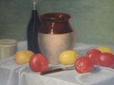 un tableau représentant un vase, des citrons et un couteau posés sur une table