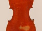 an old violin with the back of the back of it ' s neck