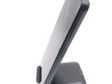 a close up of a cell phone on a stand