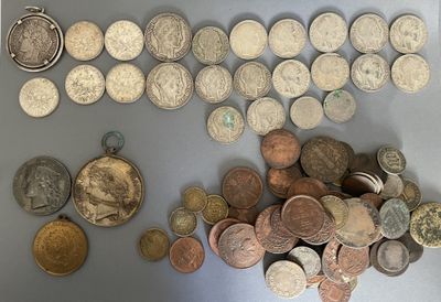 a lot of coins that are on the table