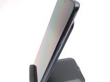 a phone that is sitting on top of a stand