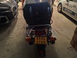 a motorcycle that is parked in a garage