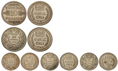 an image of a group of old coins on a white background