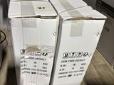 two boxes that are stacked on top of each other on the floor