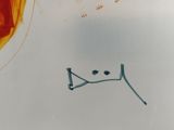 a drawing of a cat on a plate on a table