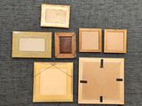 several pieces of cardboard are laid out on a carpet
