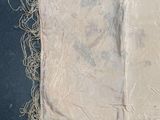 a piece of cloth that has been stitched together