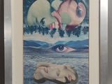 tableau représentant une femme allongée par terre devant une image d'éléphant