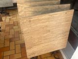 several pieces of wood are stacked on top of each other on a table