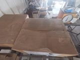a cardboard box sitting on top of a table in a room