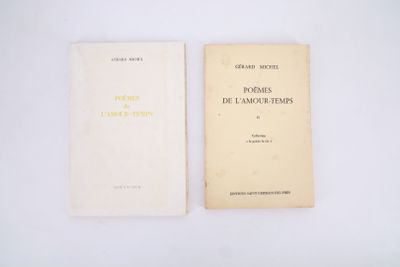 two books sitting on top of a white table next to each other