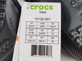 a close up of a pair of shoes with a price tag on them