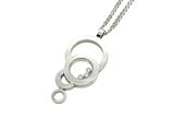 silver necklace with a circular pendant and a diamond on a chain