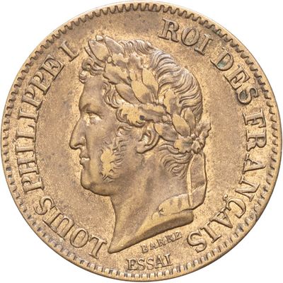 Gros plan sur une pièce d'or portant une tête d'homme