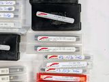 many different types of tape in a plastic container