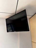 1 téléviseur écran plat mural PROLINE