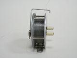 a reel that is sitting on a white surface