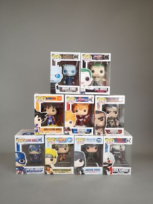 a lot of pop vinyl figures stacked on top of each other