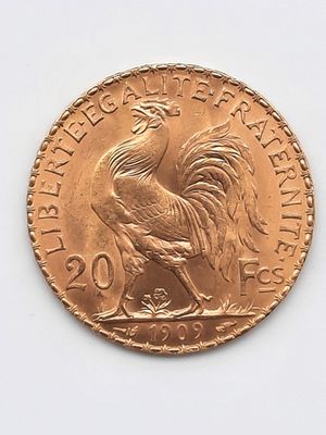 une image représentant une pièce d'or sur laquelle est représenté un coq