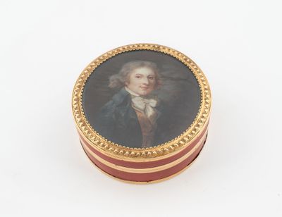 une image représentant une boîte miniature sur laquelle est peint un homme