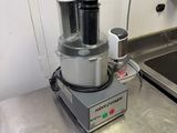 a food processor sitting on a counter in a kitchen