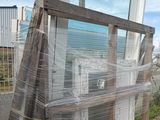 a window that has been wrapped up on a pallet