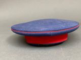 an image of a red and blue hat sitting on top of a table