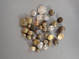 a pile of coins sitting on top of a table
