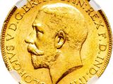 gros plan d'une pièce d'or sur laquelle figure le visage d'un homme