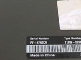 a label on the back of a laptop that says serial number