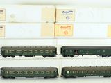 four train cars that are on display in a display case