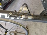 a close up of a bike that is parked in a garage