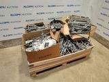 many boxes of screws and bolts on a pallet