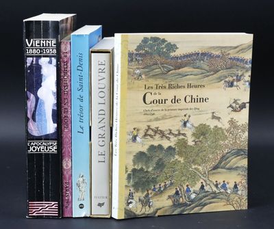 three books sitting on top of a table next to each other