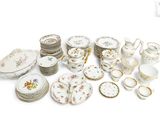 many different types of porcelain dishes and cups and saucers