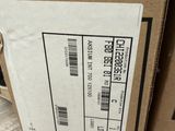 a box with a package on top of it on the floor