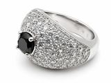 a close up of a black and white diamond ring on a white background