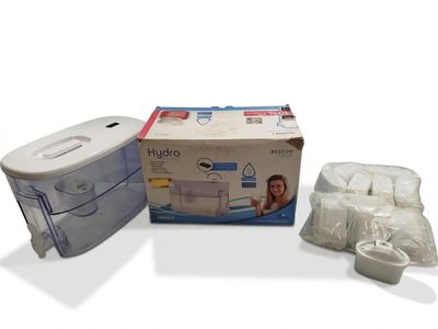 a box of toilet paper and a tissue dispenser next to it