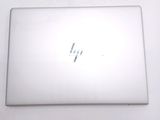a laptop that is sitting on a white table