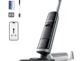 l'aspirateur sans fil est connecté à un téléphone et à une télécommande